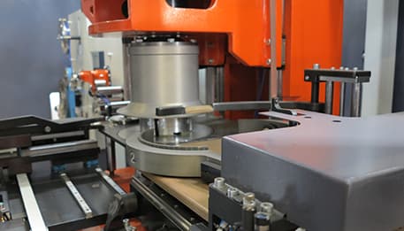 Automatic Coiling Machine - Orange and Gray Coiling Mechanism